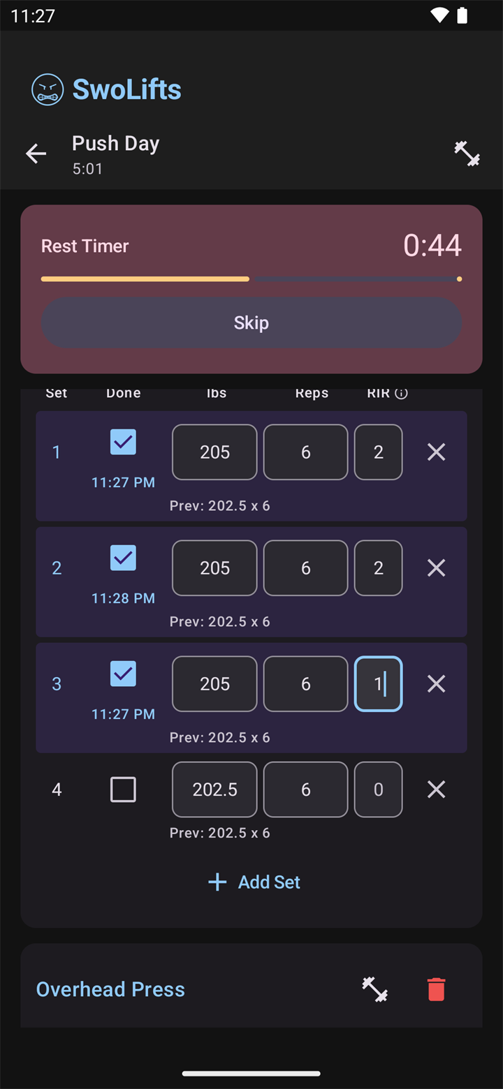 Active workout with completed sets and a running rest timer